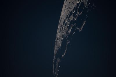 Moon crescent limb with dramatic shadows